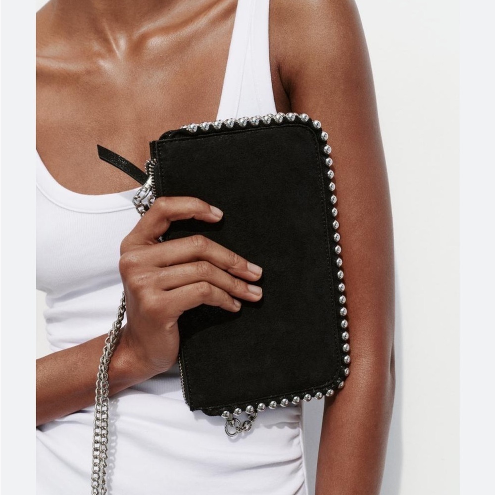 Zara black with silver detailing bag .